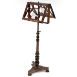 A WILLIAM IV ROSEWOOD DUET STAND, the lyre-shaped adjustable rests on brass telescopic shaft &