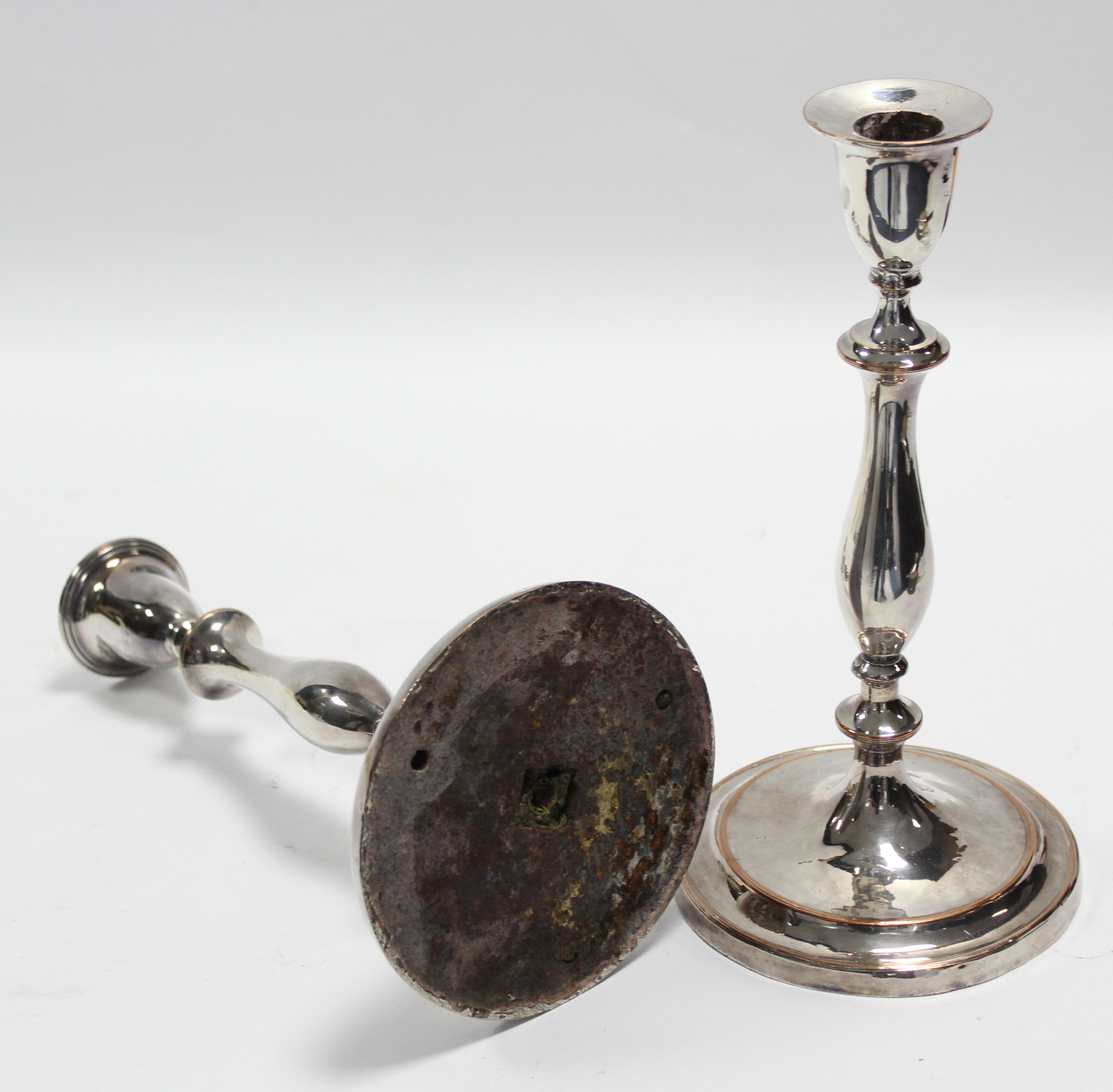 A pair of late 18th century Sheffield candlesticks with vase-shaped nozzles, slender baluster - Image 2 of 2