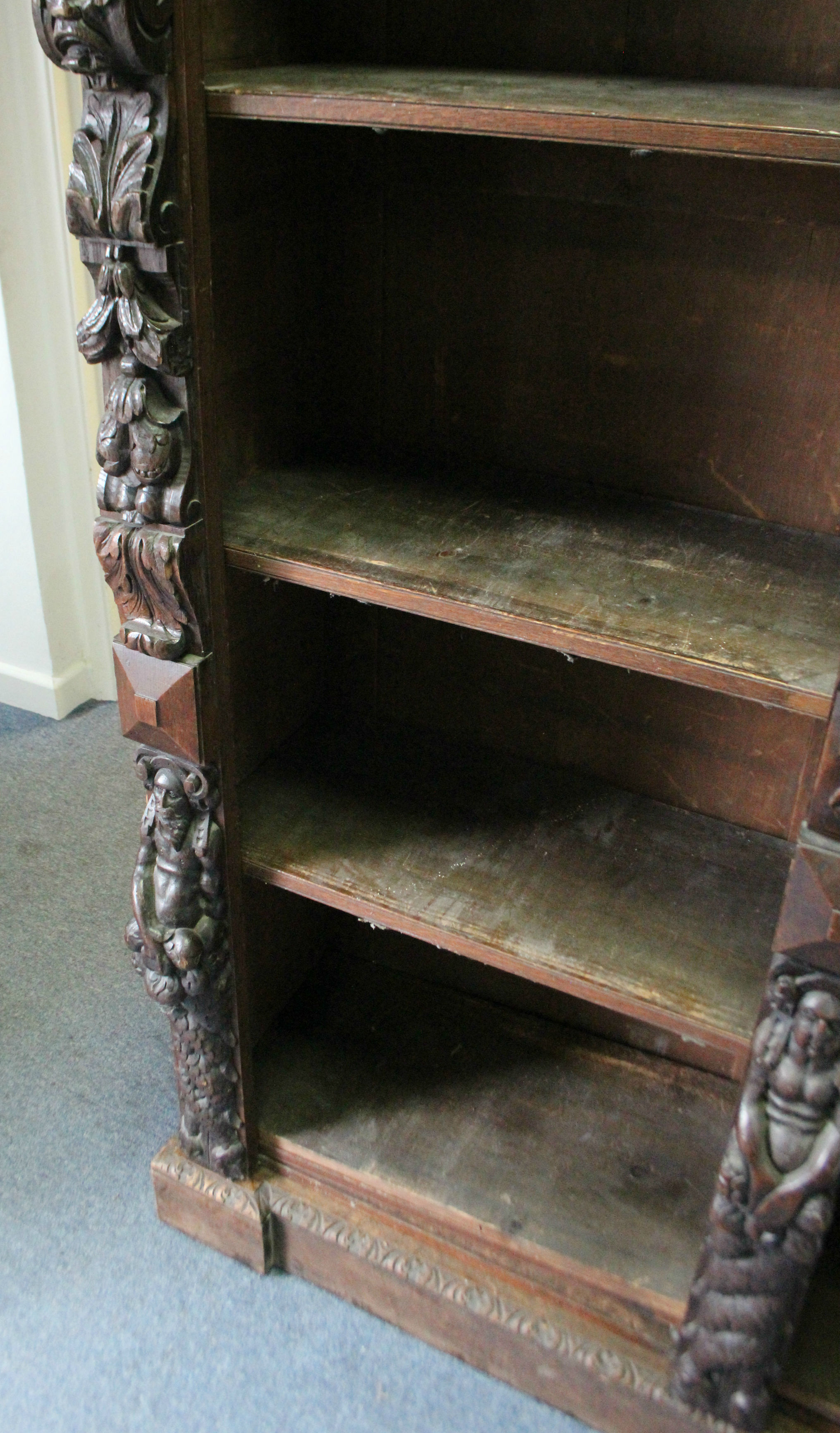 A Victorian oak tall standing open bookcase fitted fourteen adjustable shelves, and heavily carved - Image 7 of 7