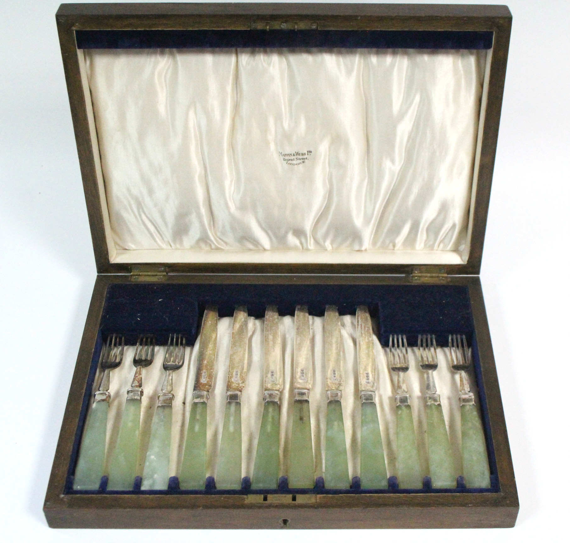 A set of six pairs of George V silver dessert knives & forks with onyx block handles; Sheffield 1919