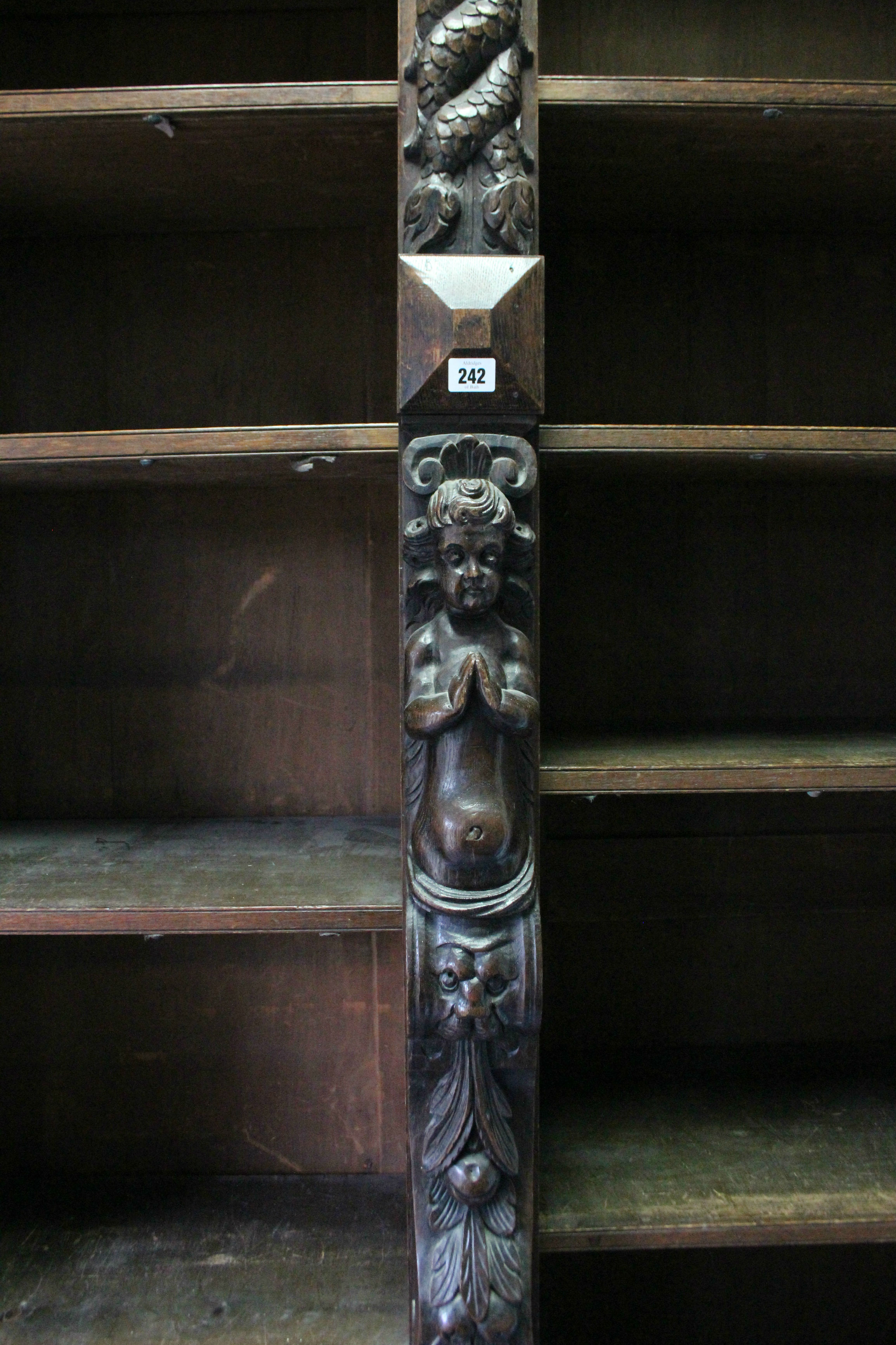 A Victorian oak tall standing open bookcase fitted fourteen adjustable shelves, and heavily carved - Image 2 of 7