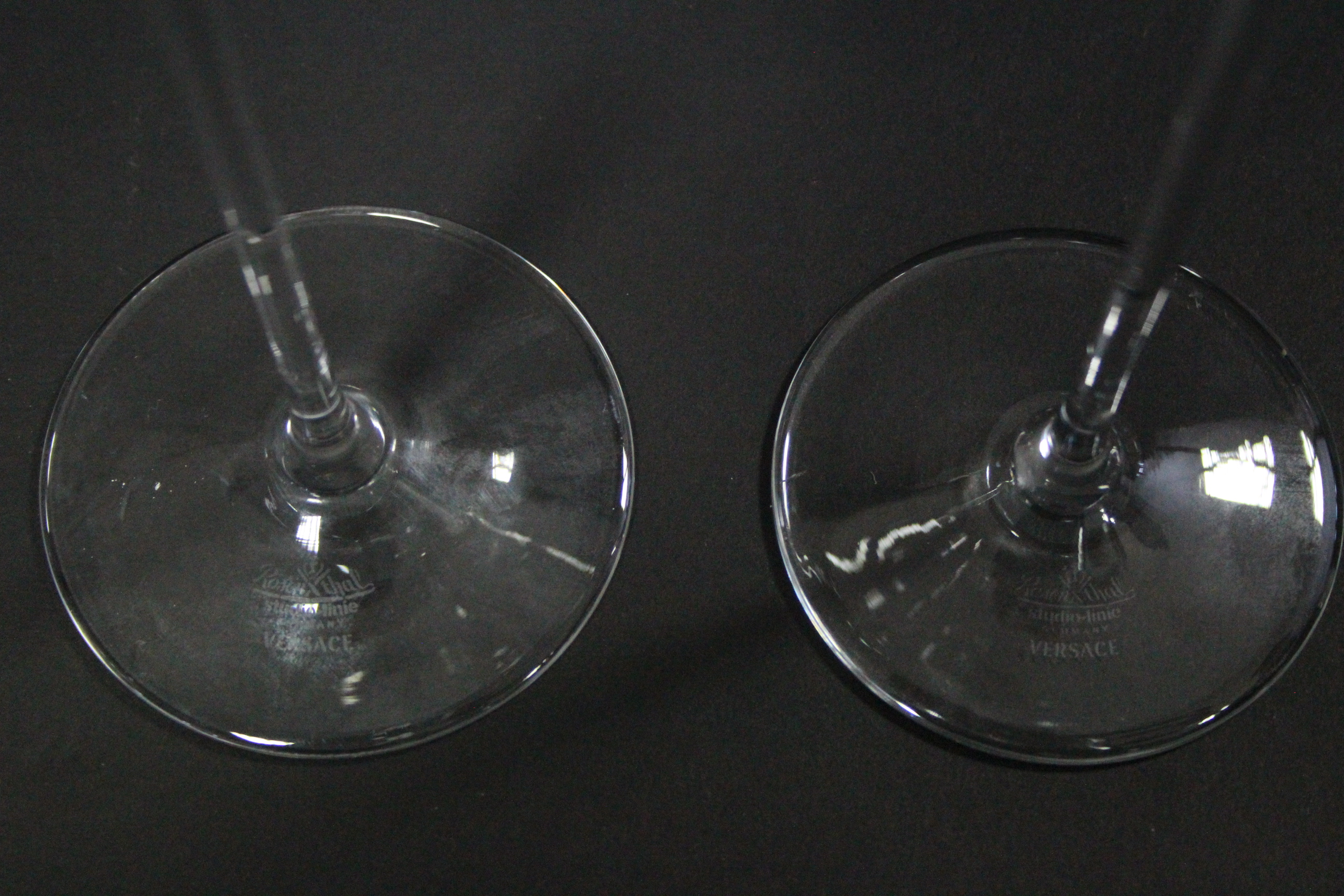 A pair of Rosenthal “Versace” wine glasses, each with opalescent figure-head to the stem; 11¾” - Image 3 of 3