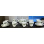A Wedgwood bone china "Santa Clara" pattern twenty-three piece tea service (settings for six); &