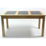 A ditto dining table inset three tempered-glass plates to the rectangular top, & on square legs,