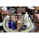 A pair of pewter candlesticks (converted to table lamps); & various bottles & jars, etc.