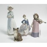 A Beswick kitten ornament; & three Lladro female figures.
