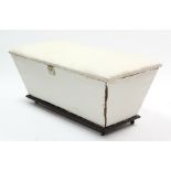 A cloth-covered deal blanket box with hinged lift-lid, canted sides, & on ceramic castors.
