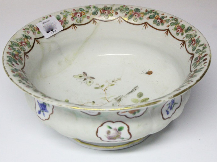 A 19th century Meissen porcelain circular bowl with painted bird design to centre & with floral