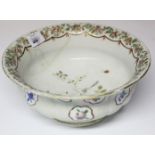 A 19th century Meissen porcelain circular bowl with painted bird design to centre & with floral