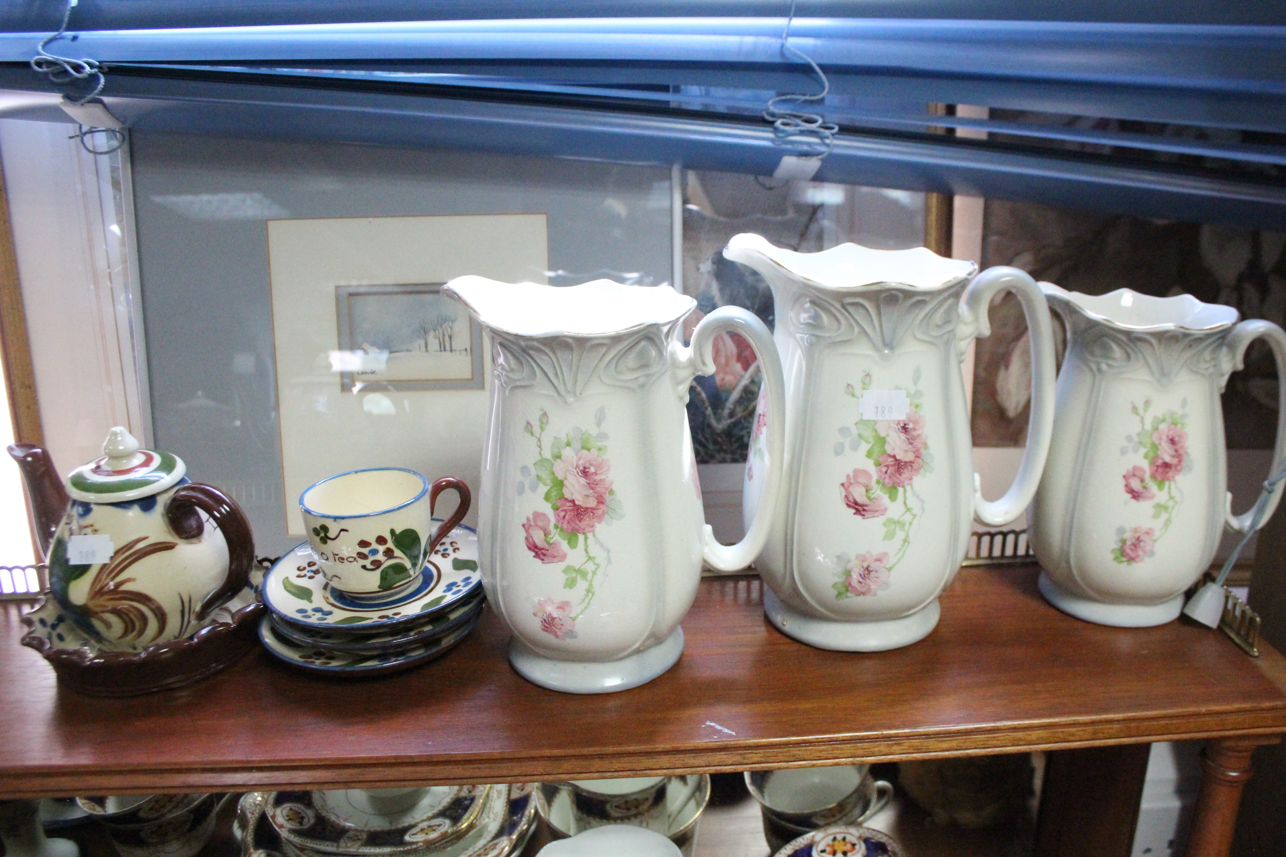 A Victorian china floral decorated extensive thirty-four piece part tea service; a set of three - Image 3 of 4