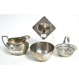 An Edwardian silver cream jug, 3¼" high, Sheffield 1903; a George V silver sugar bowl, 3 ¾" diameter