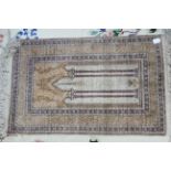 An eastern small prayer mat, 38" x 24"; a Canon camcorder, with case; various items of plated