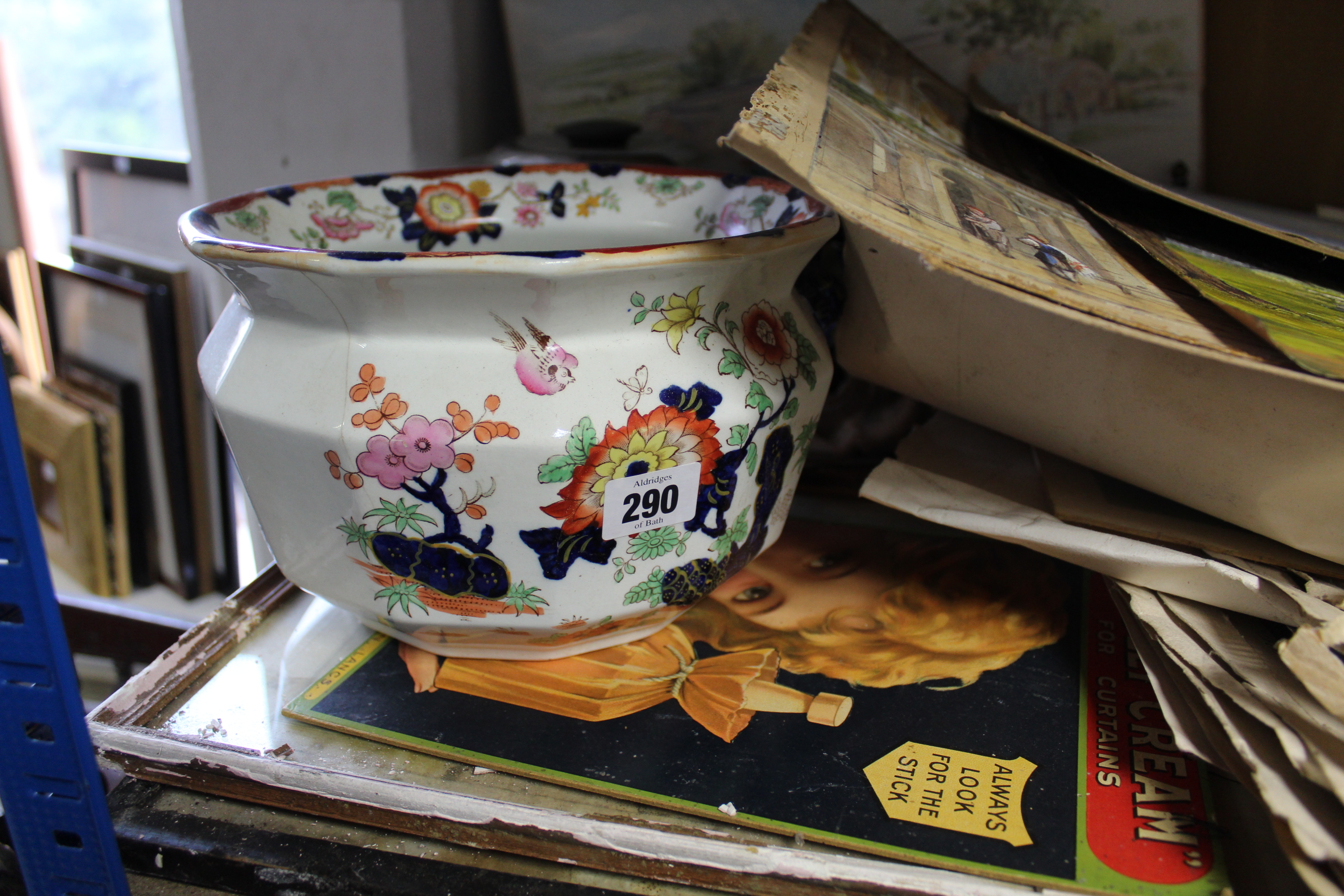 A Mason’s ironstone china floral decorated chamber pot w.a.f.; a brass table lamp with shade;