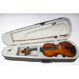 A modern violin, with case