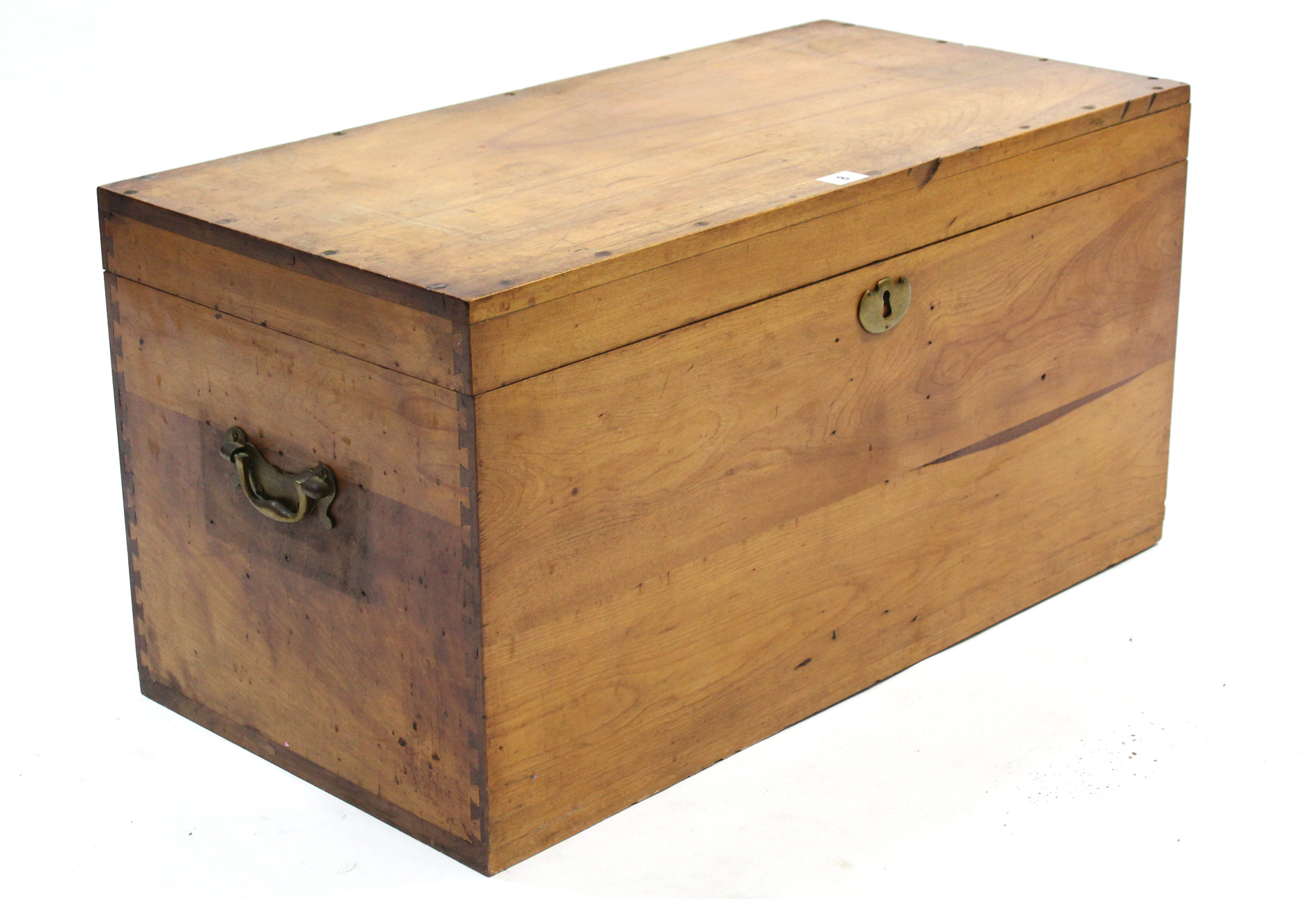 An early-mid 20th century camphor wood trunk with hinged lift-lid & brass side handles, 30" wide x