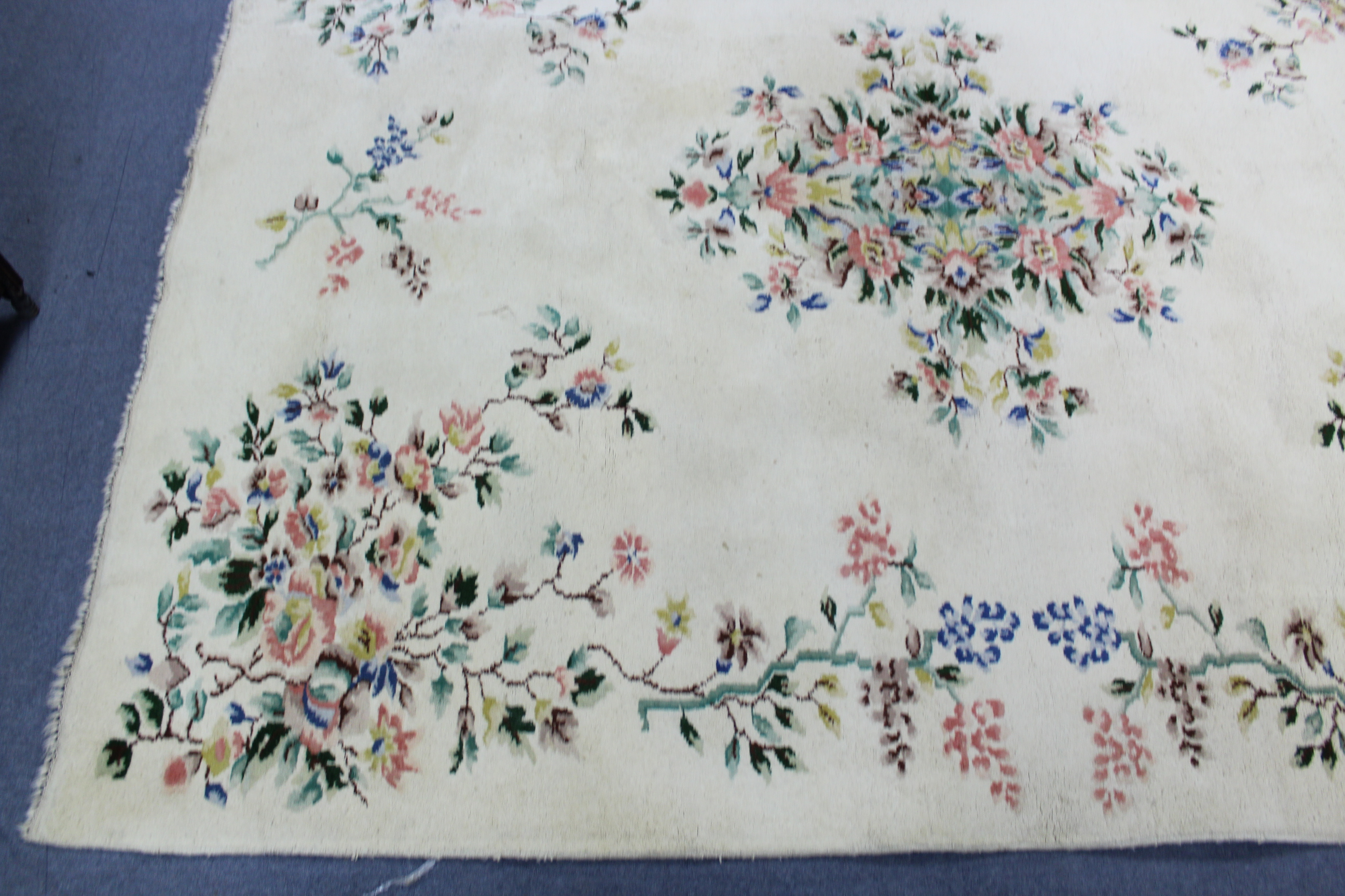 An Indian carpet of off-white ground & with all-over multicoloured floral design, 9' 7" x 12'. - Image 2 of 5