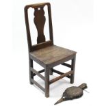 A 19th century oak country dining chair with shaped splat back, hard seat, & on square legs with