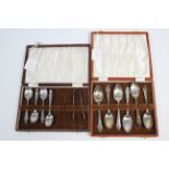 A set of six George V silver teaspoons with fancy terminals Sheffield 1931; a ditto set of four