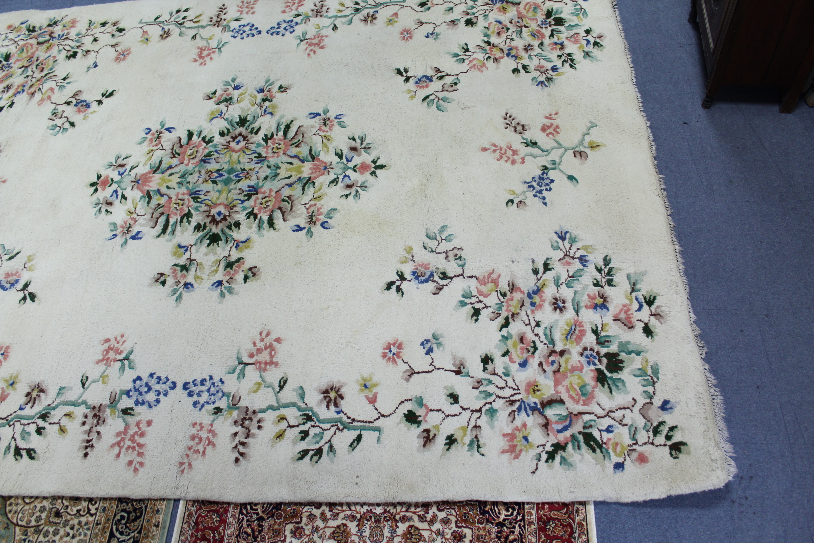 An Indian carpet of off-white ground & with all-over multicoloured floral design, 9' 7" x 12'. - Image 4 of 5