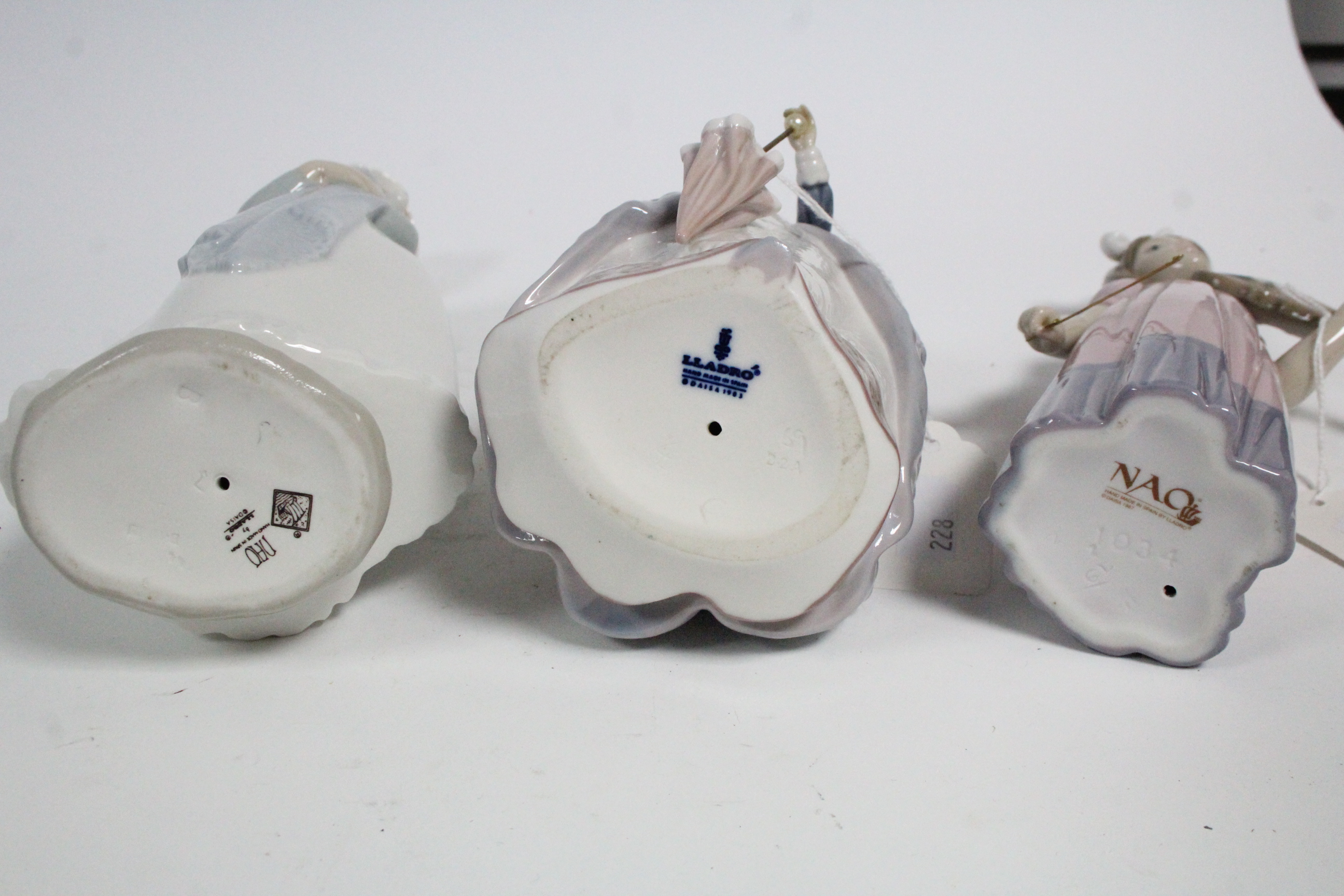 A Beswick kitten ornament; & three Lladro female figures. - Bild 3 aus 3