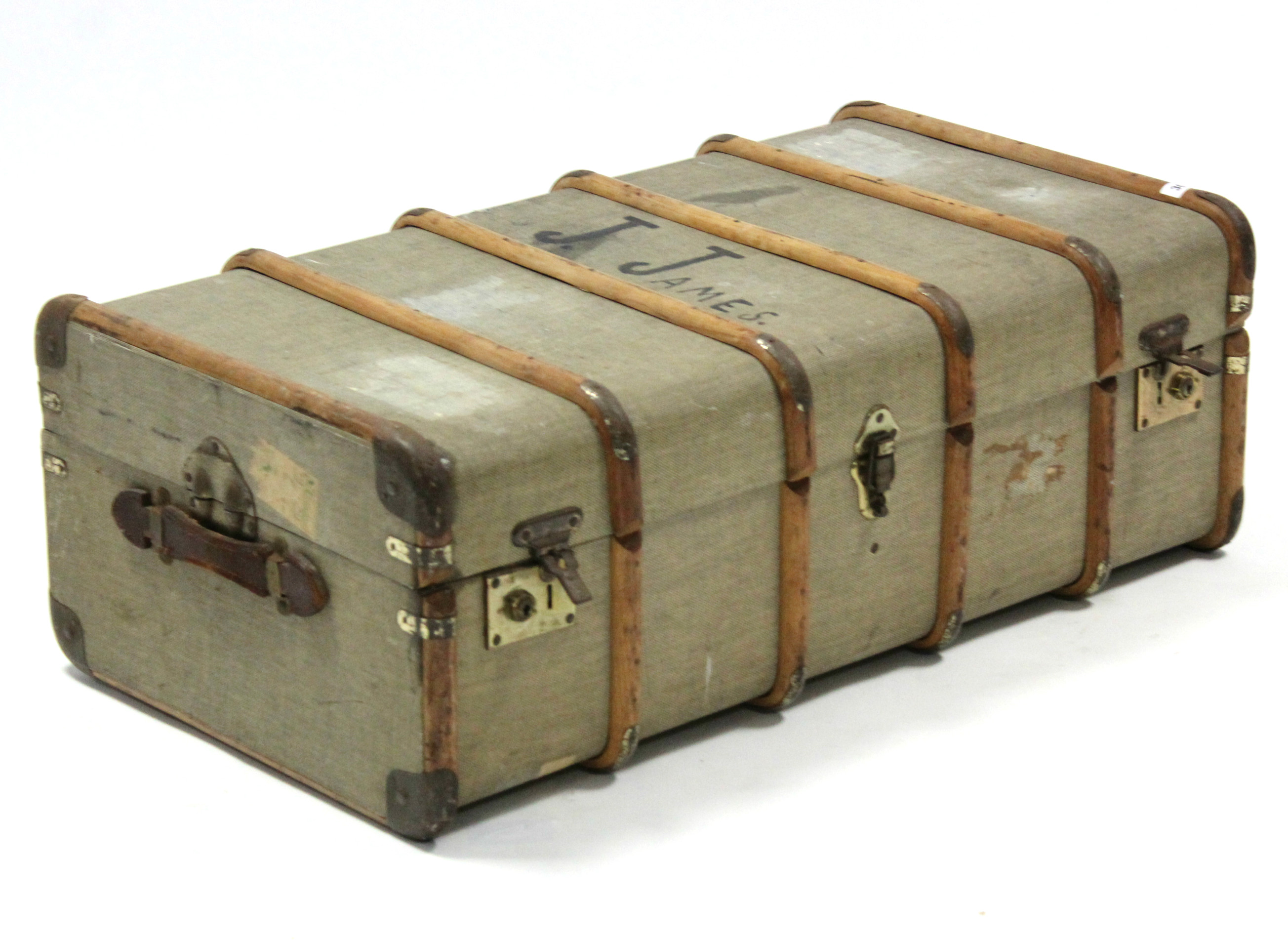 An early-mid 20th century fibre-covered travelling trunk, 35¾" wide.