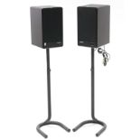 A pair of Microlat hi-fi speakers with stands.