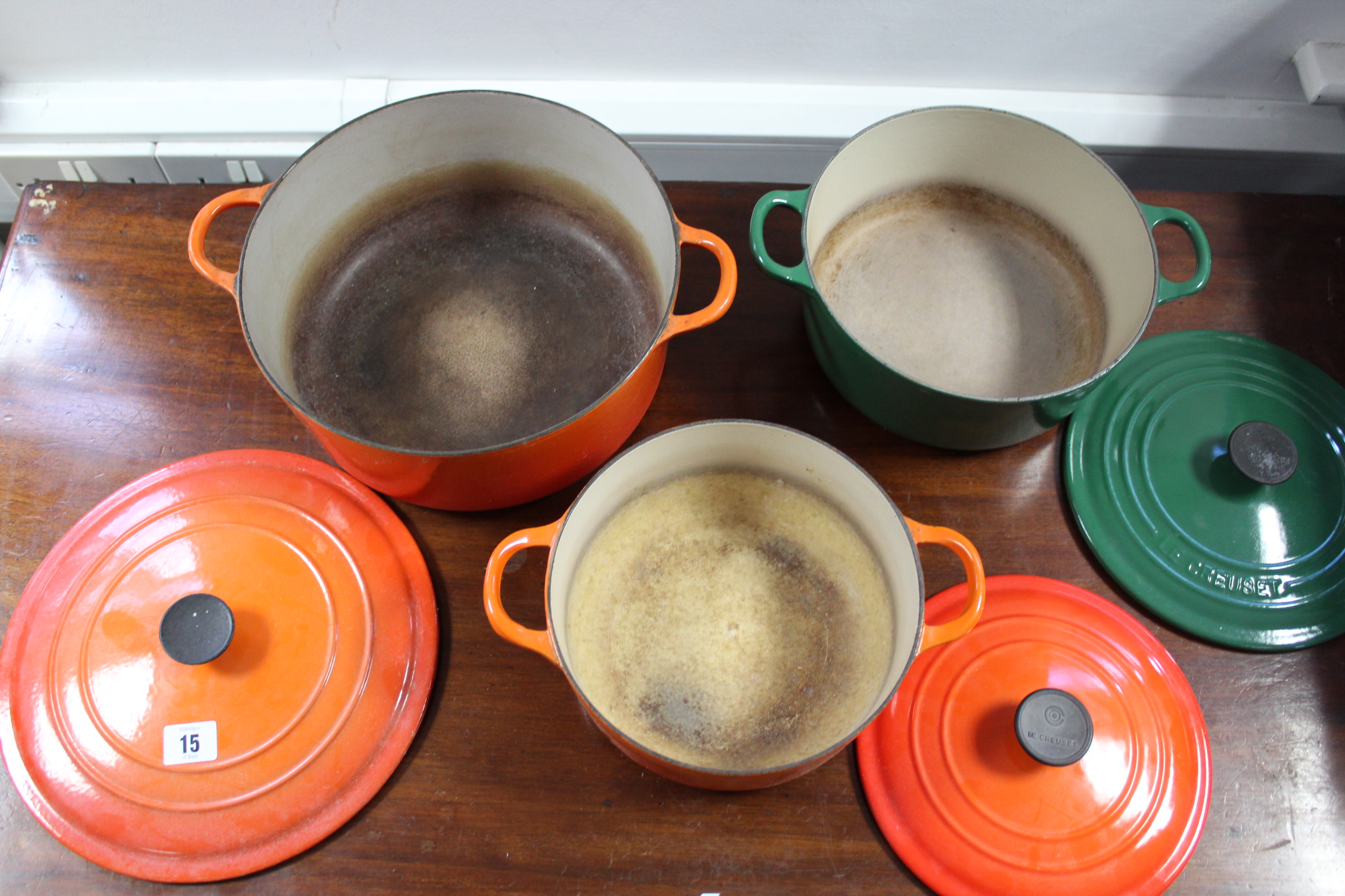 Two Le Creuset orange enamelled cooking pots, & a green glazed ditto. - Bild 2 aus 2