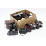 A pair of Swift 7X-12X zoom binoculars, with case; together with six various cameras; & various