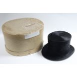 A Linney of London black silk top hat; with a contemporary oval cardboard hat box. Provenance: The