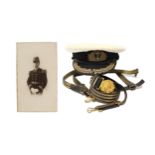 An early 20th century naval officer’s sword belt; a ditto naval officer’s peaked cap; & a ditto
