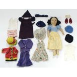 A 1930’s Chad Valley “Snow White” doll, 16” high, dressed; together with various items of dolls