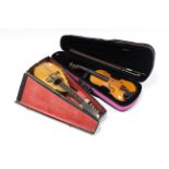 A violin & bow, 23” long; & a mandolin, 24” long, each with case.