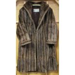 A Maxwell Croft of London & Bath silk-lined fur ladies three-quarter length coat. Provenance: