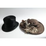 An M Mares of Luton black silk top hat; together with three Edwardian ladies hats. The Prideaux