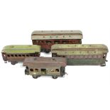 Four German lithographed tinplate “O” gauge model railway coaches.