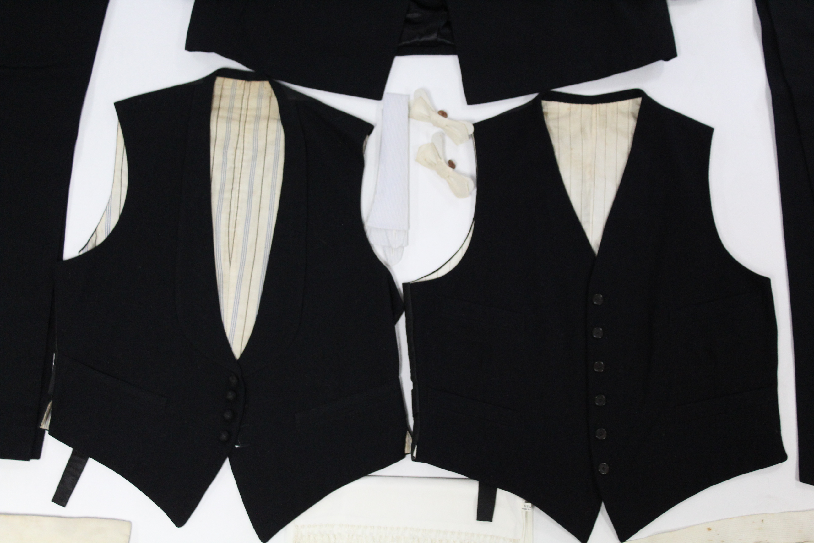 A collection of mid-20th century gent’s clothing, including a dinner suit & accessories; gaiters;