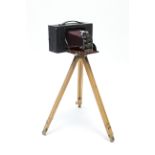 An Eastman Kodak “No 4 screen focus Kodak” box camera, with tripod; a Rolleicord box camera,