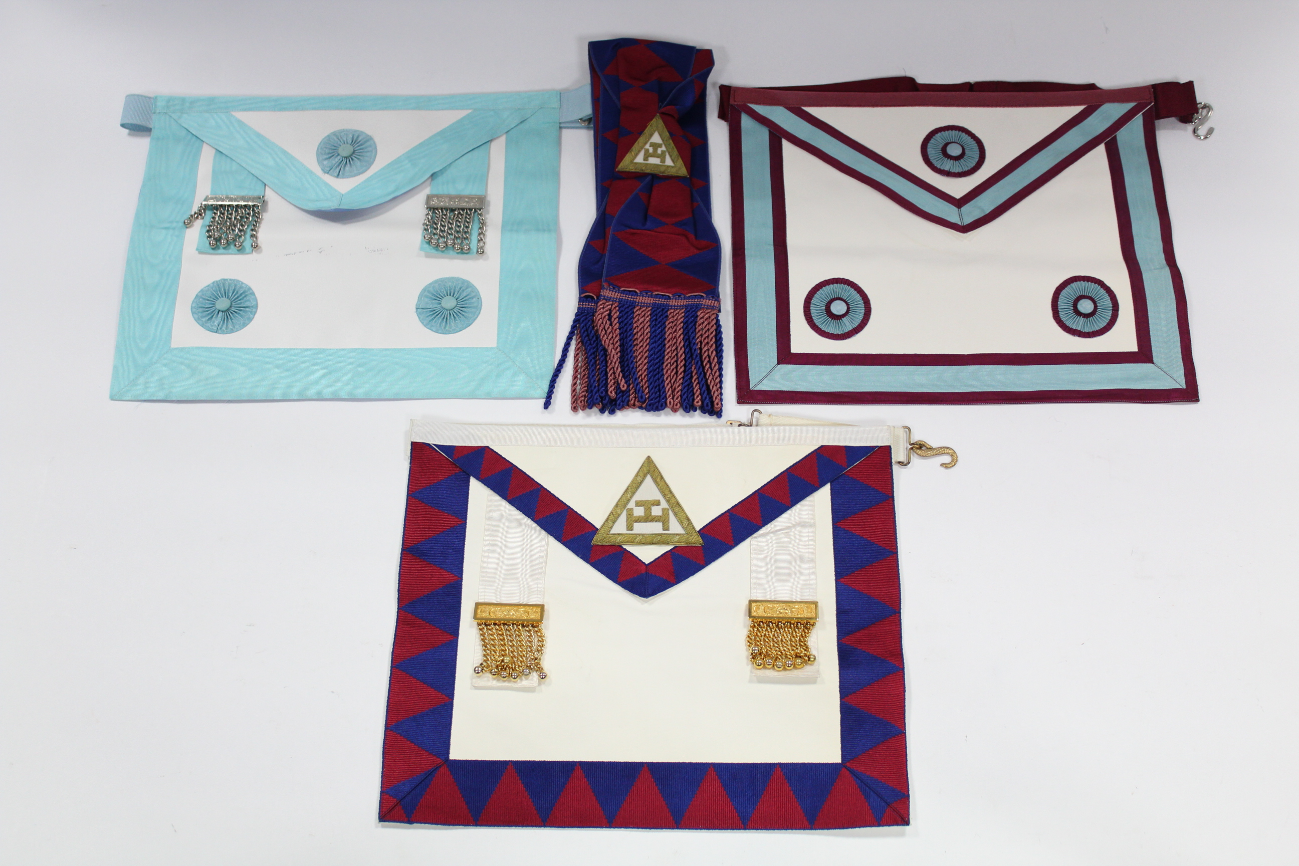 Four Masonic regalia medals; four ditto aprons; & various other Masonic regalia items, contained