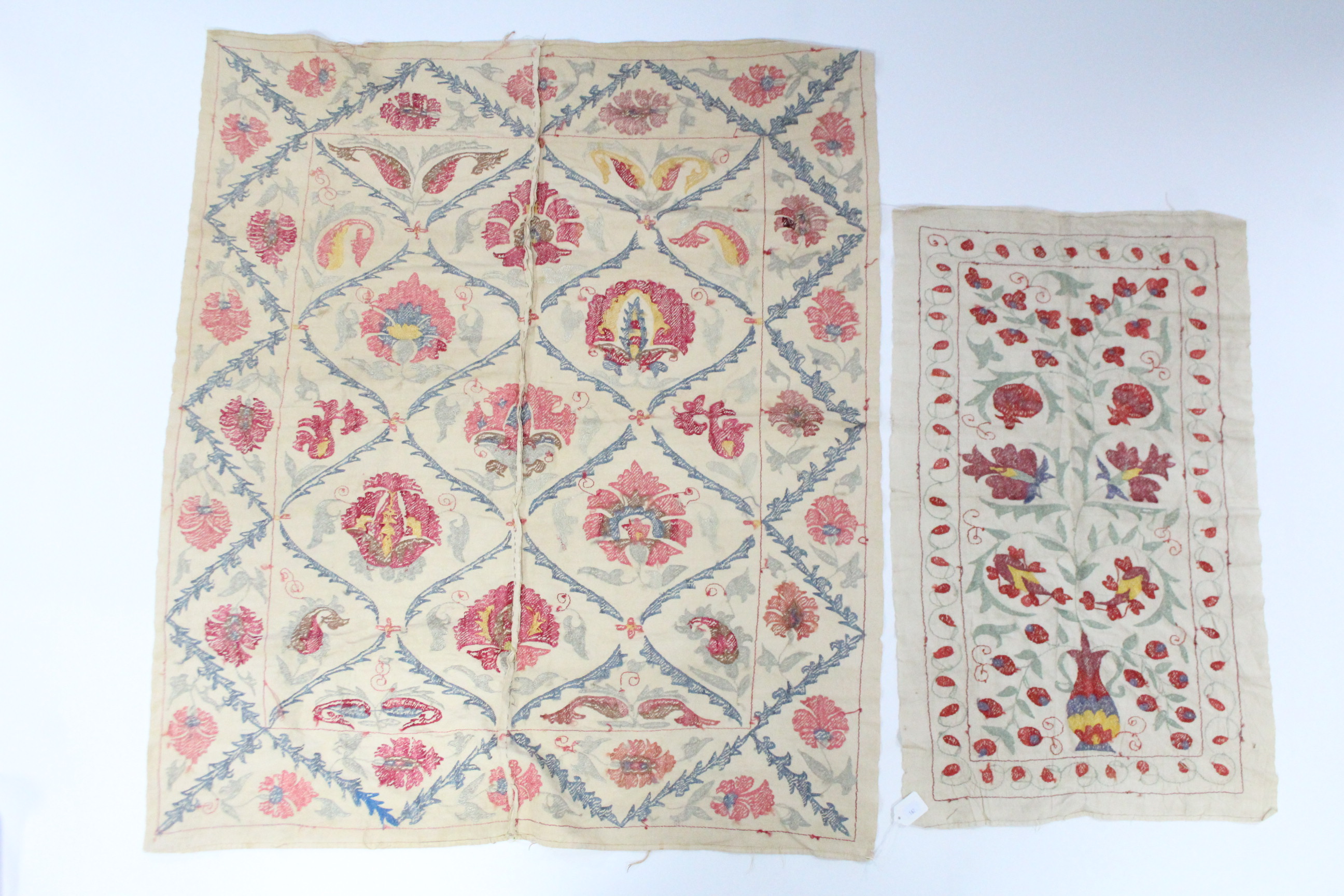 An Indian embroidered coverlet of cream ground, with multi-coloured stylised floral decoration, - Image 4 of 4