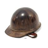 A mid-20th century Texolex miner’s safety helmet.