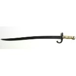 A 19th century French rifle bayonet with 1868 inscription to the 22½” long single-edge curved blade,