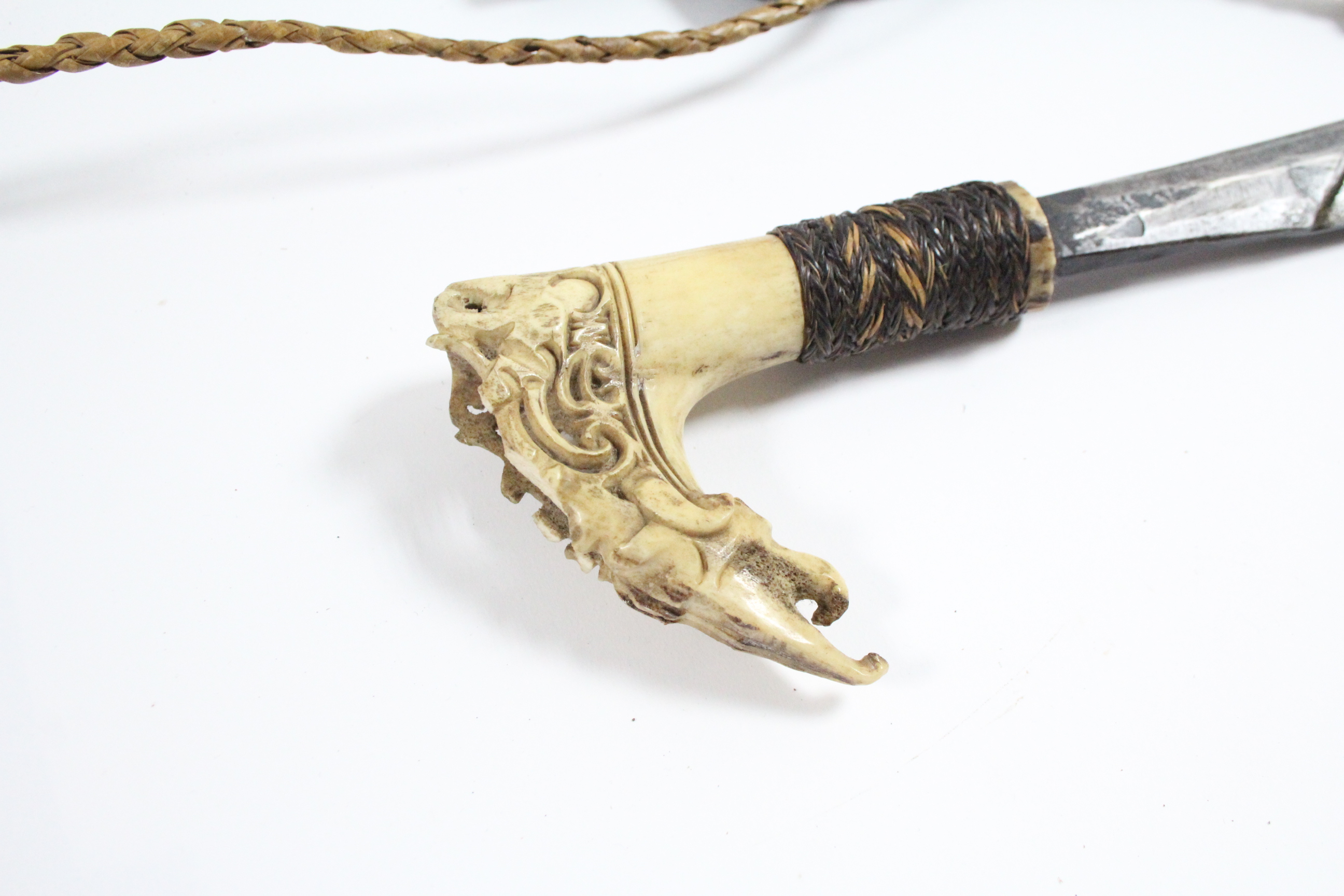 A Borneon ceremonial knife with 18½” long single-edge curved blade, with carved bone handle, & - Image 4 of 5
