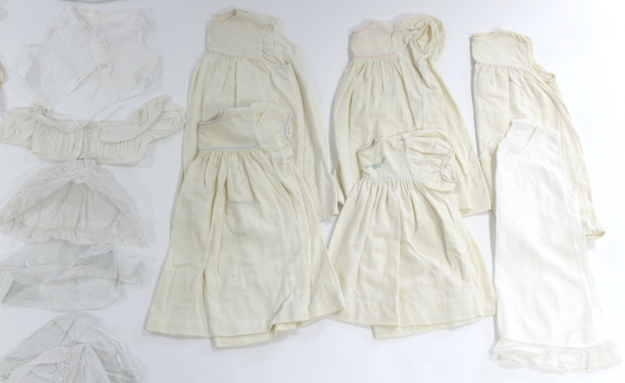 Five early 20th century cream flannel wrappers; two hand-knitted cream wool shawls; five circa - Image 2 of 5