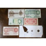 A £1 note (Warren Fisher, 1919-1933); another (Beale, 1948-62); a 10/- note (O’Brien, 1948-62); a