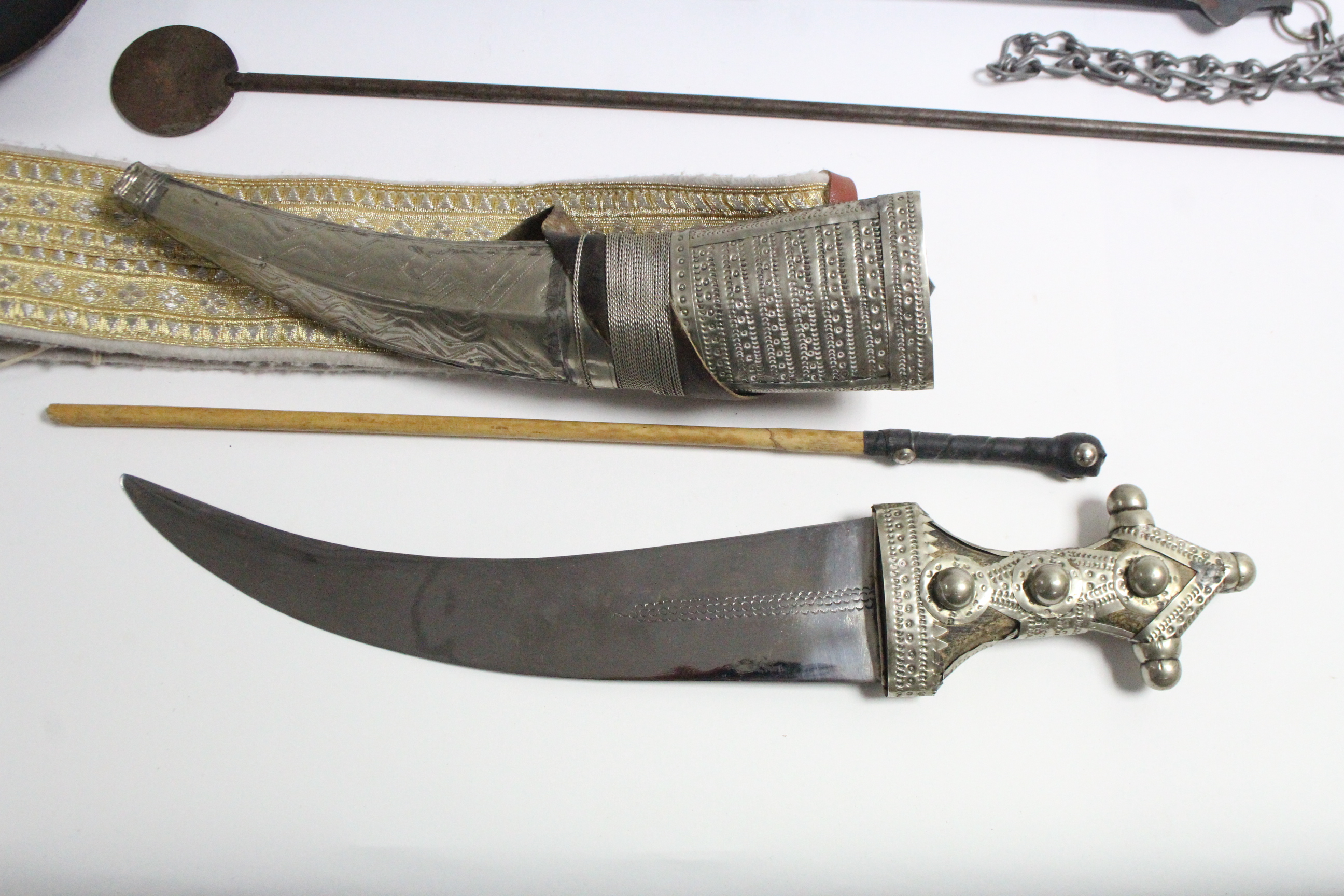 A Saudi Arabian dress dagger with sheath & belt; & a Bedouin iron coffee roaster. - Image 2 of 3