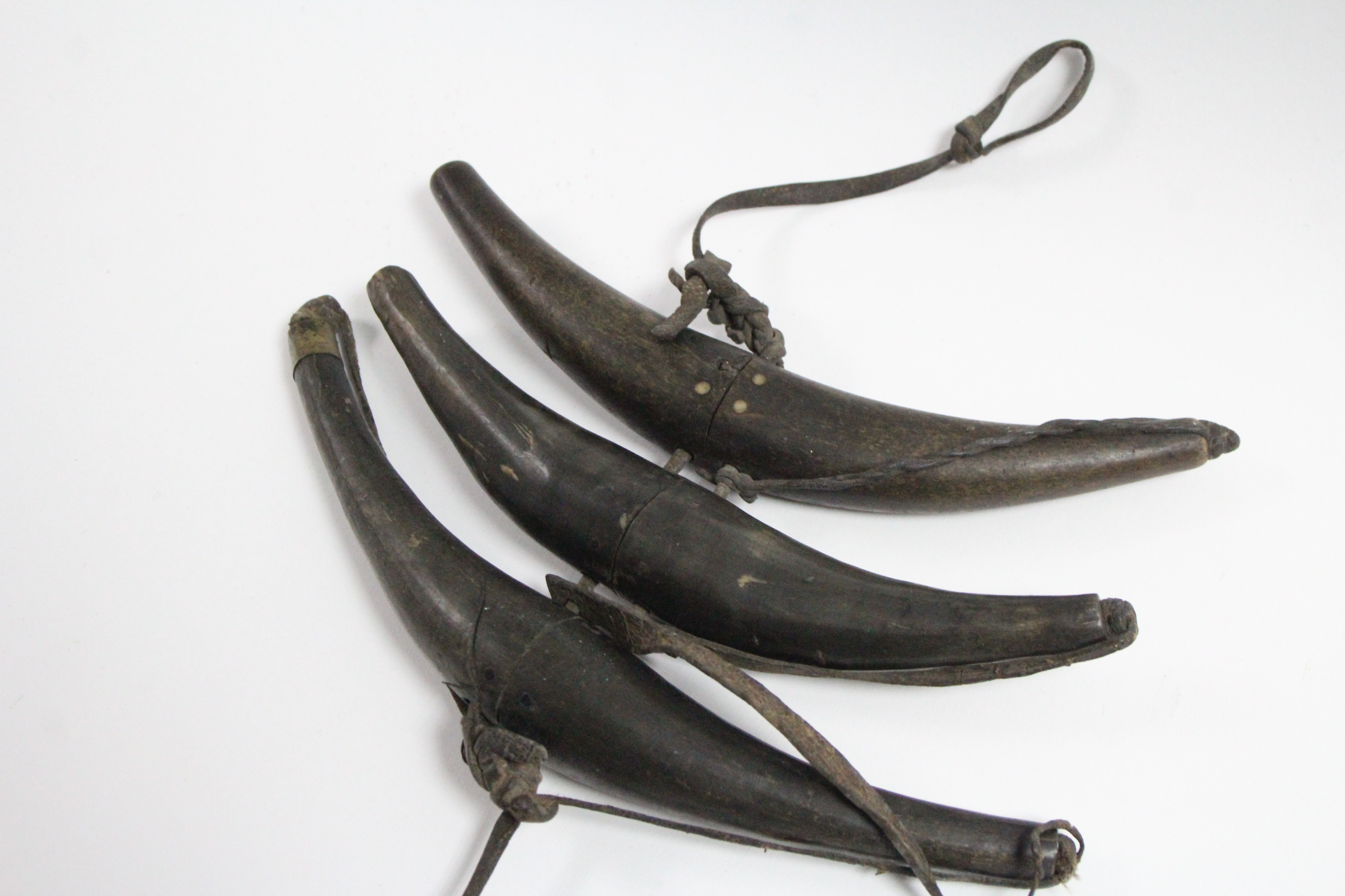 A Tibetan shot pouch; & three ditto powder horns. - Image 2 of 4