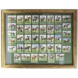 A set of W. D. & H. O. WILLS cigarette cards “Racehorses & Jockeys 1938”, in glazed display;