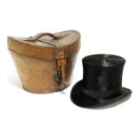 A black silk top hat; & a leather hat box stamped “H. Greaves of Birmingham”. Provenance: The