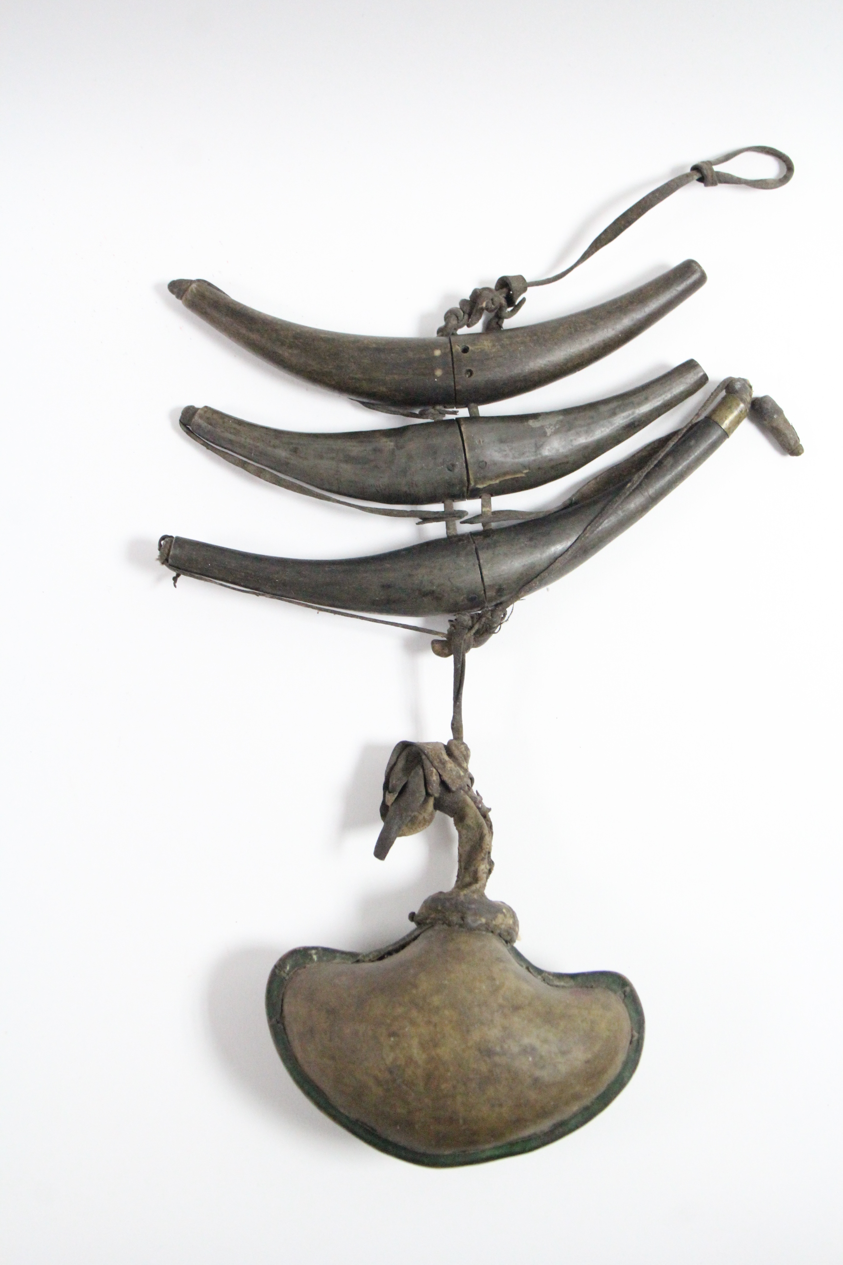 A Tibetan shot pouch; & three ditto powder horns. - Image 4 of 4