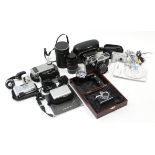 A Praktica PL Nova 1B camera; a Minox miniature retro-style 90mm camera; four other cameras; &